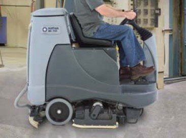 Compact ride on scrubber dryer - Nilfisk BR855 battery powered ride-on scrubber dryer